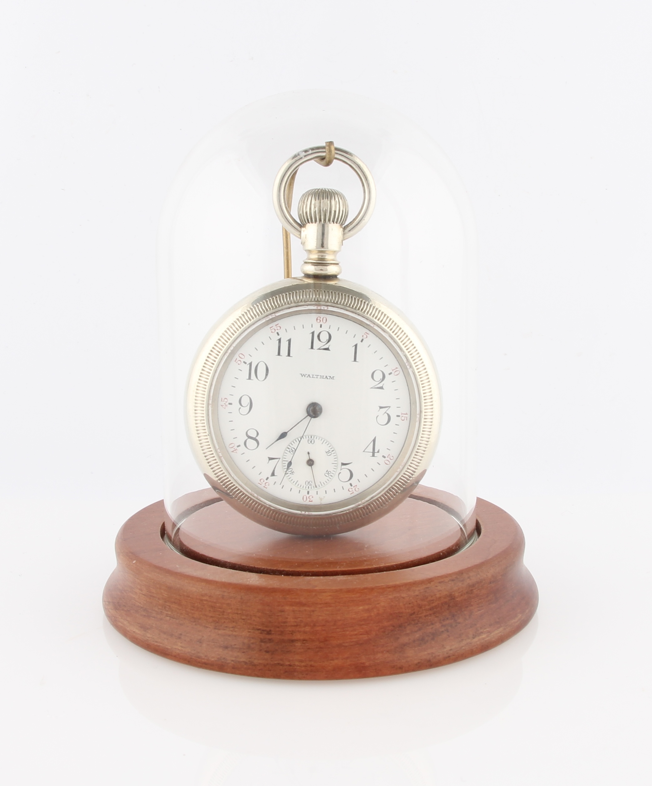 A Waltham chrome open face crown wind pocket watch, the white dial having hourly Arabic numeral