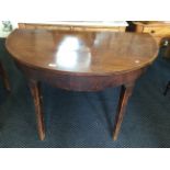 An early 19th century mahogany D end dining table with one central leaf to middle and square