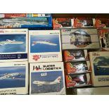 Four boxes of various die cast vpcars and airplanes.