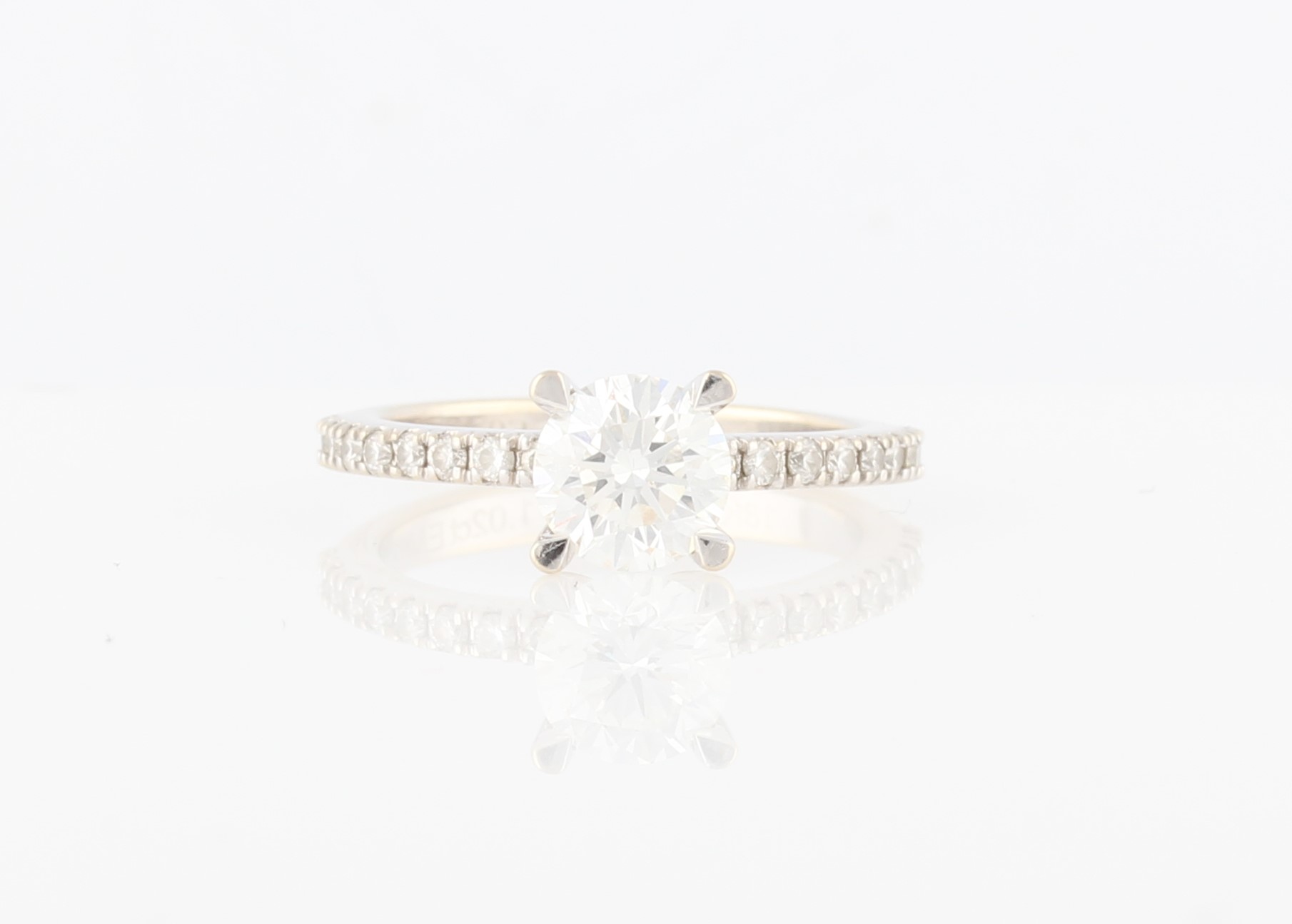 A diamond ring, set with a principal round brilliant cut diamond, measuring approx. 1.02ct,