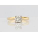 An 18ct yellow gold diamond solitaire ring, set with a princess cut diamond, measuring approx. 1.