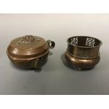 A small Tibetan teapot and pot with pierced collar. Heights 7.5cm and 7cm.