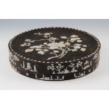 A Chinese circular cosmetic box, the lid having a mother of pearl floral design with edge of box