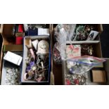 Two boxes containing costume jewellery, watches and clocks.