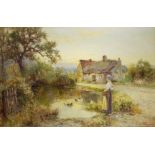 EARNEST WALBOUND. Framed, signed oil on canvas depicting a lady stood outside a cottage by a