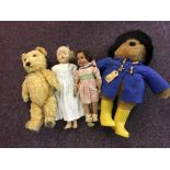 Two composite dolls, with Paddington and another bear.