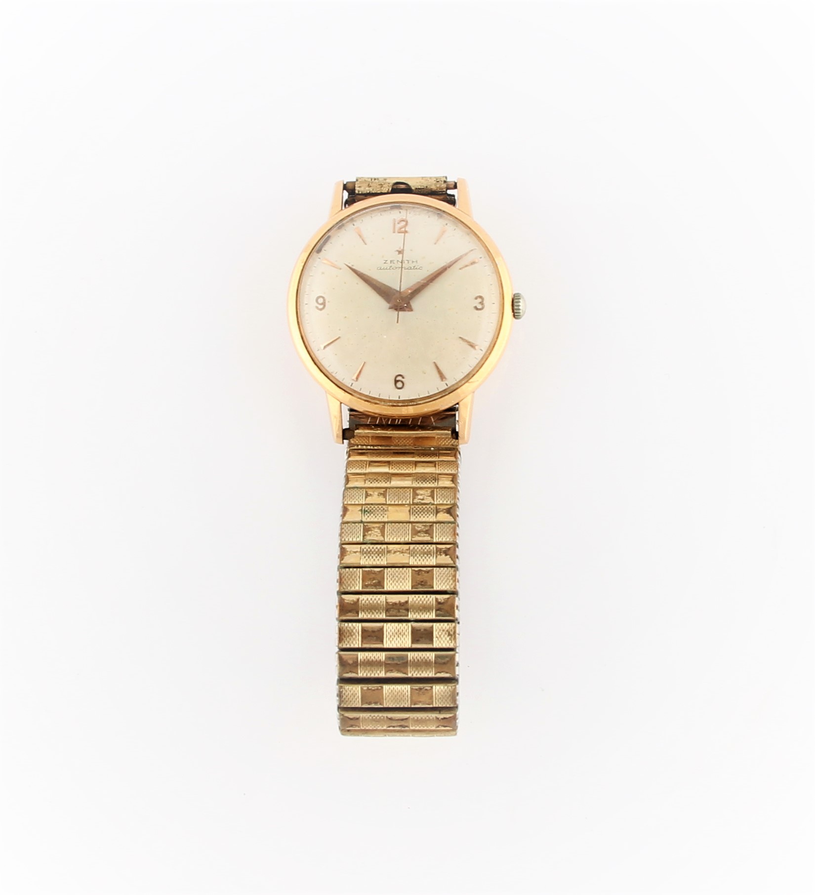 A gents Zenith wrist watch, the champagne tone dial having hourly arrow markers with quarterly