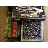 A box of plastic toy soldiers, board games including part Subbuteo set.