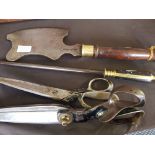 An F. Eardley mahogany and brass handled meat cleaver with a set of Wilkinson tailor scissors, a