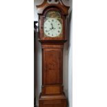 Oak and mahogany long cased clock by Bott of Bromsgrove with painted face and Roman numerals.