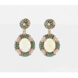 A pair of opal, diamond and green stone drop stud earrings, set with an oval opal cabochon,