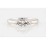 A platinum diamond solitaire ring, set with a marquise cut diamond, measuring approx. 0.50ct,