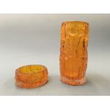 A Whitefriars tangerine ‘bark’ glass vase, height 22.5cm and ashtray, diameter 12cm.