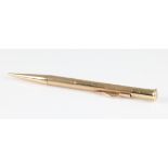 A 9ct yellow gold propelling pencil, engraved 'Dad', hallmarked Birmingham 1946.