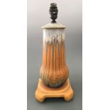 A Ruskin orange and blue design lamp base, height 43cm.