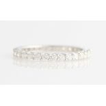 *A diamond full eternity ring, set with 30 round brilliant cut diamonds, total diamond weight