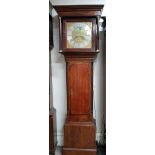 Oak long cased clock with brass engraved dial by Lanson with Roman numerals.