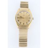 A gold plated gents Omega Genève wrist watch, the gold-tone dial having hourly baton markers with