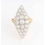 A diamond cluster ring, the navette shaped head set with 21 old cut diamond of varying sizes,