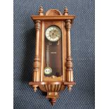 Walnut Vienna style wall clock.