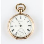 A gold plated Waltham crown wind open face pocket watch, the white enamel dial having hourly Roman