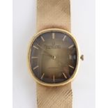 A gents 18ct yellow gold cased Universal Geneve Golden Shadow Date automatic wrist watch, the