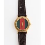 A ladies Gucci wrist watch, with a green and red dial, bezel engraved with Roman numerals, reverse