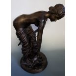 A large bronze figure of semi-naked lady pouring water, 69cm.