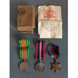 World War Two Defence, Victory and 1939-45 Star medals, belonging to J Wells, with postage box and