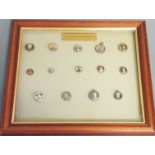 A framed and glazed display of British Boer Commanders badges.