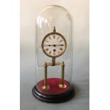 A glass domed mantel clock, height approximately 37cm.