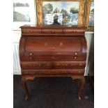 A mahogany reproduction brass inlay bureau with cylinder top.