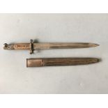 An English bayonet with leather sheath, marked 1903.