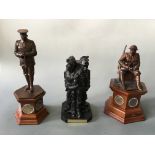 Two Danbury Mint World War One commemorative bronzed sculptures on wooden plinths with sets of WWI