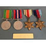 World War Two Defence, Victory, Africa and 1939-45 Stars medals belonging to Lt JR Holland RE,