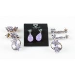 Four dropper earrings, one made from various gemstones and three set with tanzanite stone, stamped