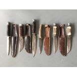 Trench knives, including bone handled, four with sheaths, six in total.