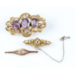 A collection of three brooches, to include an Edwardian 9ct yellow gold memorial brooch, star set