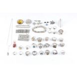 A collection of white metal jewellery to include rings, bracelets and brooches.