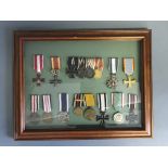 A framed and glazed collection of World War One German medals.