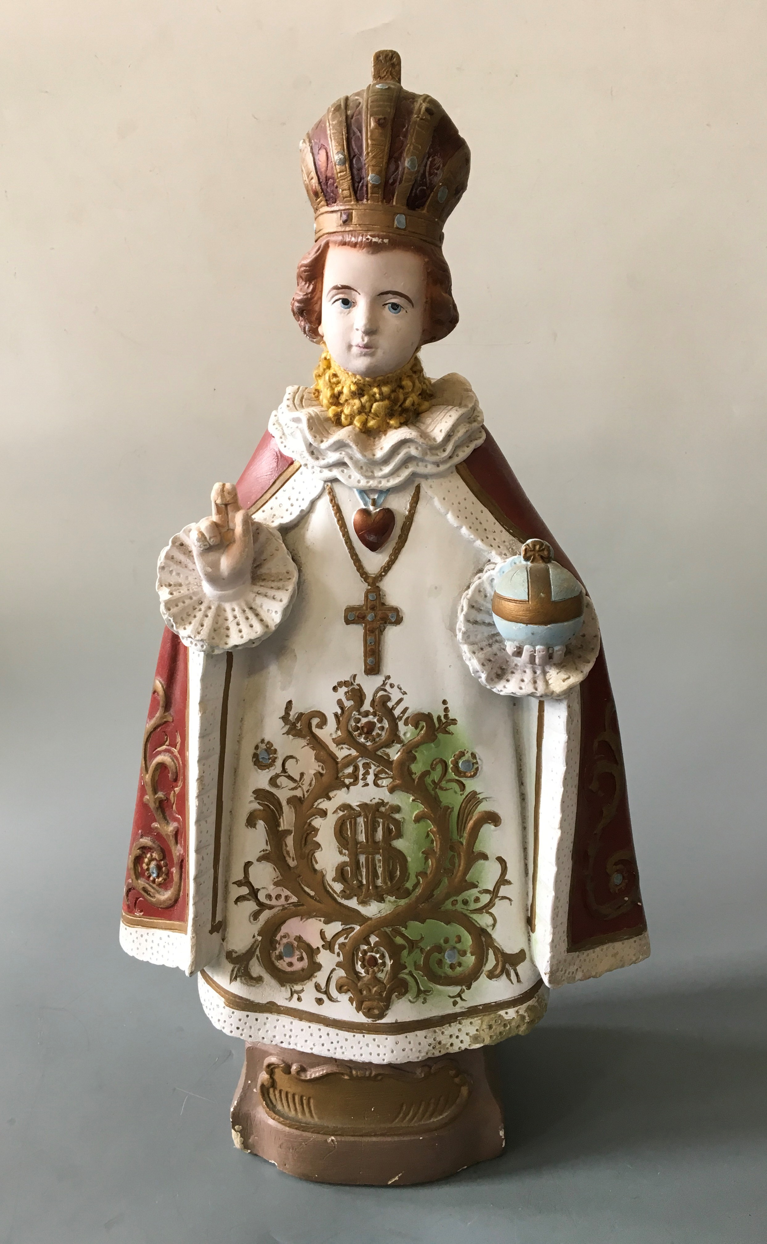 A painted chalk sculpture of Infant Jesus of Prague, height 54cm.