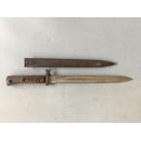 A German bayonet with metal sheath.