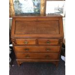 A mahogany fall at front bureau fitted with two long and two short drawers.