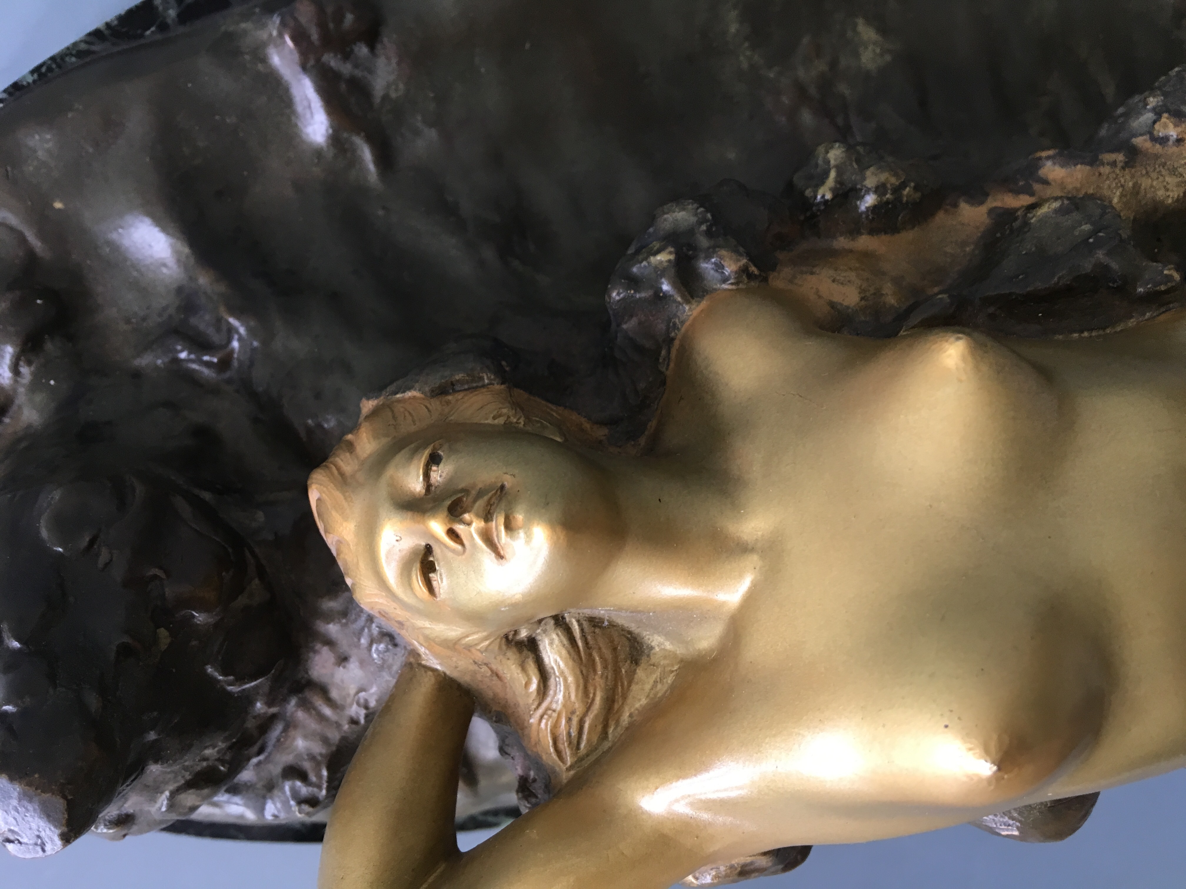 DROUARD. A signed, gilded bronze nymph lying on waves, on black and green marble base, length of - Image 3 of 5