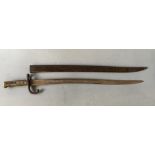 A French bayonet with sheath marked 1868.