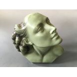 SALVATORE MELANI. An Art Deco green painted bust of female, marked 92, Deposé, height 36cm, width