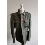 A replica WWII German two piece uniform.