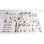 A collection of flatware, to include two Georgian silver spoons, a Victorian silver spoon, tea