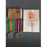 World War Two Defence and Victory medals, belonging to R Moss, with postage box and letter.