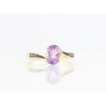 An amethyst and diamond ring stamped 925, ring size N.